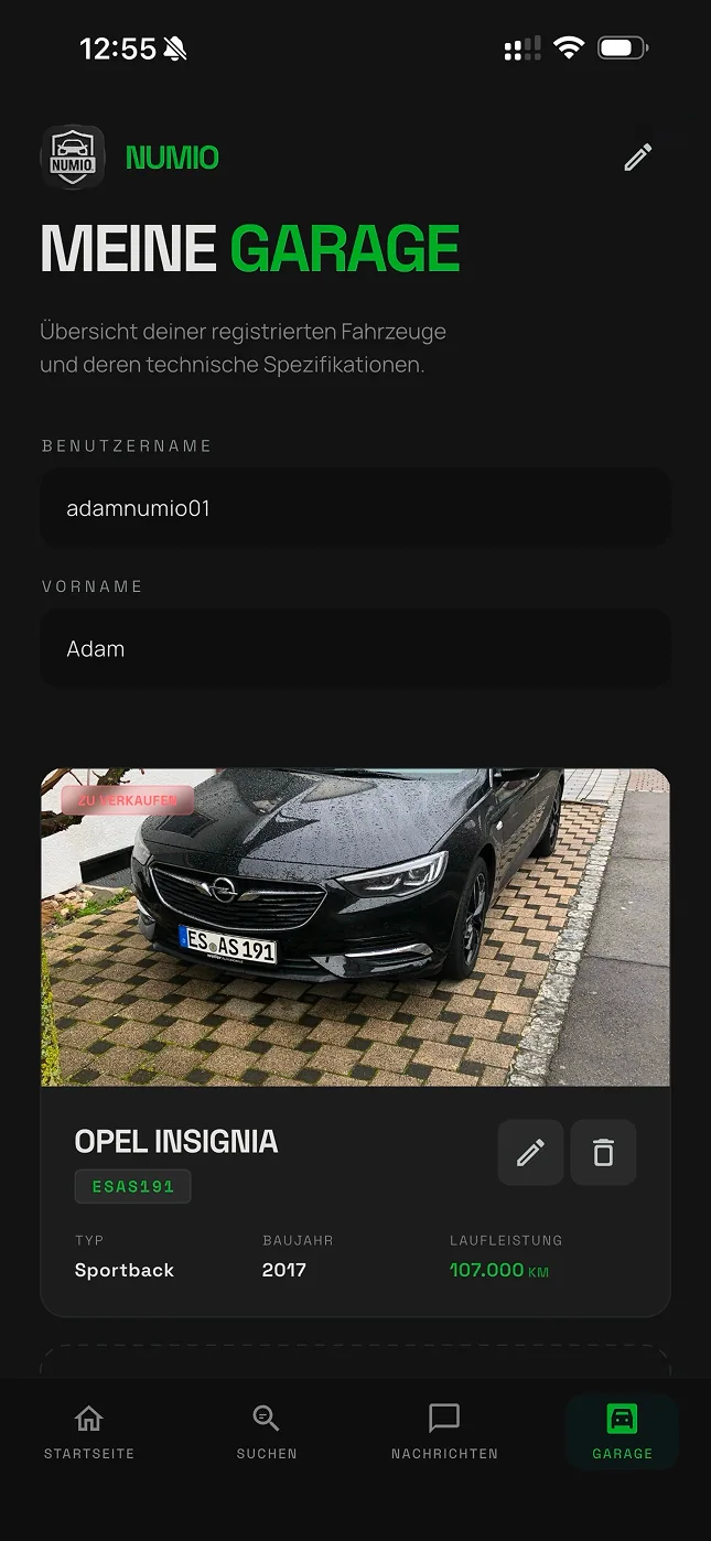 The Numio garage screen with a vehicle profile: photo, licence plate, model, year and mileage.